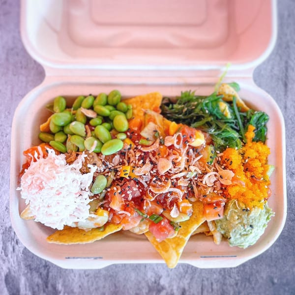 Yo Poké Fusion's poke nachos with edamame, seaweed, guacamole, fish roe, and crispy onions.